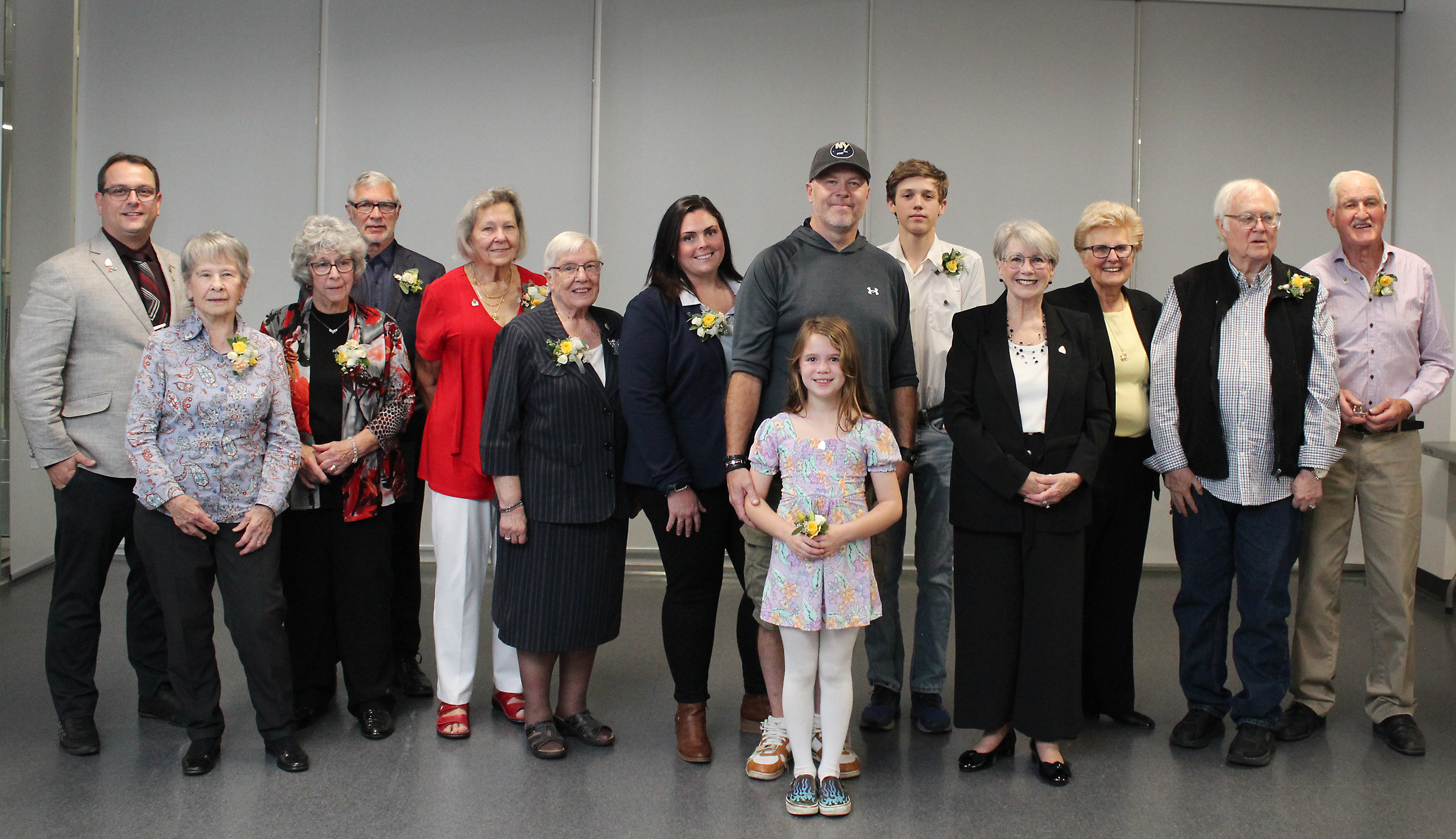 Group photo of Councillor William Reilly, Jean Acton, Joanne Battersby, Vern Dell, Kitty Hunter, Joan Packham, Nicole Scime, Shawn and Ellie Redmond, Carson McFarlane, Mayor Cheryl Ganann, Councillor Joann Chechalk, Dennis Tuck, and Cliff Travis.